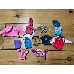 Lot of 11 vintage Barbie Doll Clothes. Tops, sweaters, jackets. multi-color